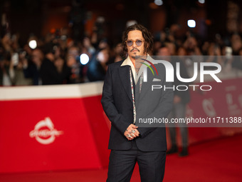 Johnny Depp attends the ''Modi - Three Days On The Wing Of Madness'' red carpet during the 19th Rome Film Festival at Auditorium Parco Della...