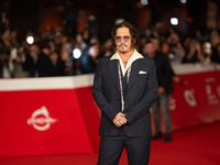 Johnny Depp attends the ''Modi - Three Days On The Wing Of Madness'' red carpet during the 19th Rome Film Festival at Auditorium Parco Della...