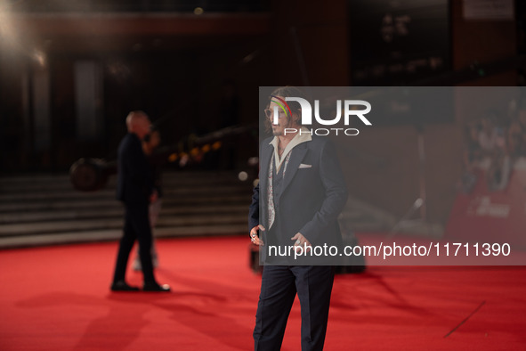 Johnny Depp attends the ''Modi - Three Days On The Wing Of Madness'' red carpet during the 19th Rome Film Festival at Auditorium Parco Della...