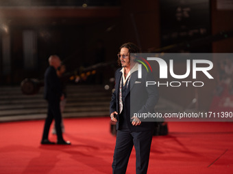 Johnny Depp attends the ''Modi - Three Days On The Wing Of Madness'' red carpet during the 19th Rome Film Festival at Auditorium Parco Della...