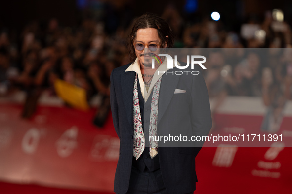 Johnny Depp attends the ''Modi - Three Days On The Wing Of Madness'' red carpet during the 19th Rome Film Festival at Auditorium Parco Della...