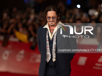 Johnny Depp attends the ''Modi - Three Days On The Wing Of Madness'' red carpet during the 19th Rome Film Festival at Auditorium Parco Della...