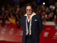 Johnny Depp attends the ''Modi - Three Days On The Wing Of Madness'' red carpet during the 19th Rome Film Festival at Auditorium Parco Della...