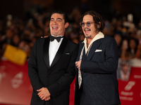 Riccardo Scamarcio and Johnny Depp attend the ''Modi - Three Days On The Wing Of Madness'' red carpet during the 19th Rome Film Festival at...