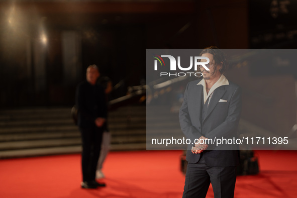 Johnny Depp attends the ''Modi - Three Days On The Wing Of Madness'' red carpet during the 19th Rome Film Festival at Auditorium Parco Della...