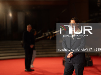 Johnny Depp attends the ''Modi - Three Days On The Wing Of Madness'' red carpet during the 19th Rome Film Festival at Auditorium Parco Della...