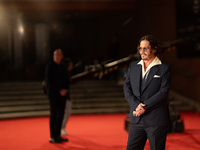 Johnny Depp attends the ''Modi - Three Days On The Wing Of Madness'' red carpet during the 19th Rome Film Festival at Auditorium Parco Della...