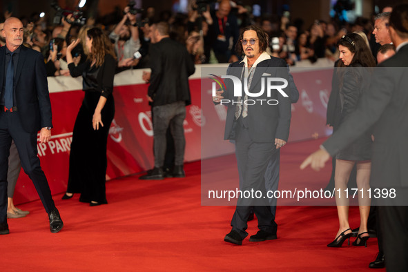 Johnny Depp attends the ''Modi - Three Days On The Wing Of Madness'' red carpet during the 19th Rome Film Festival at Auditorium Parco Della...