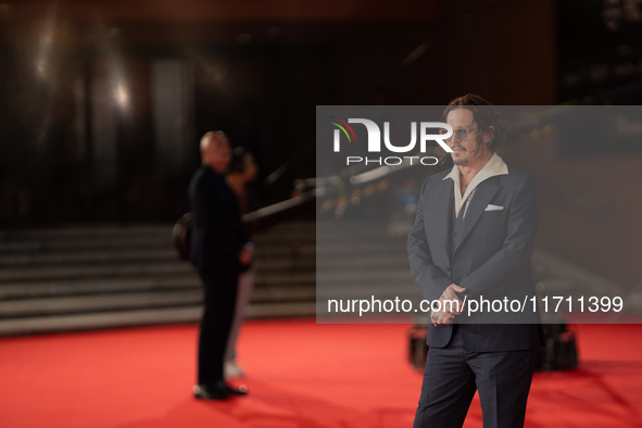 Johnny Depp attends the ''Modi - Three Days On The Wing Of Madness'' red carpet during the 19th Rome Film Festival at Auditorium Parco Della...