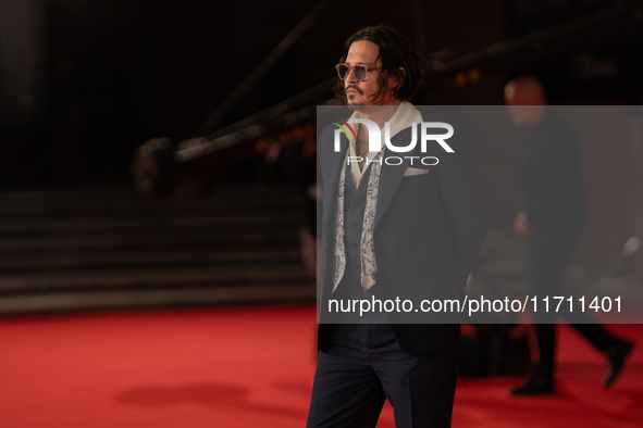 Johnny Depp attends the ''Modi - Three Days On The Wing Of Madness'' red carpet during the 19th Rome Film Festival at Auditorium Parco Della...