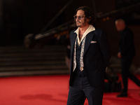 Johnny Depp attends the ''Modi - Three Days On The Wing Of Madness'' red carpet during the 19th Rome Film Festival at Auditorium Parco Della...