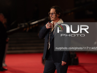 Johnny Depp attends the ''Modi - Three Days On The Wing Of Madness'' red carpet during the 19th Rome Film Festival at Auditorium Parco Della...