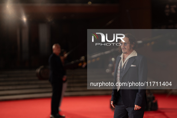 Johnny Depp attends the ''Modi - Three Days On The Wing Of Madness'' red carpet during the 19th Rome Film Festival at Auditorium Parco Della...