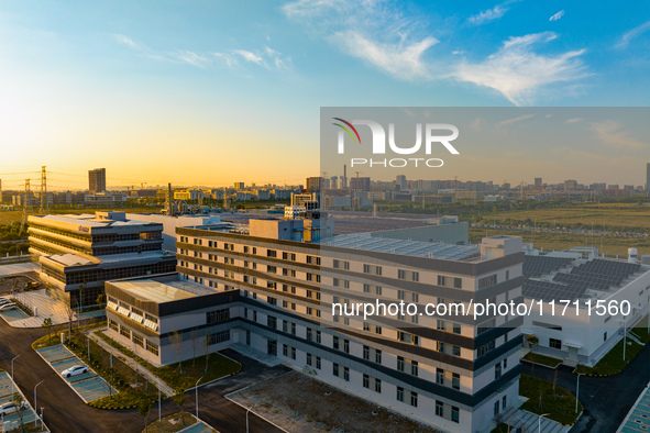 An aerial photo on October 4, 2024, shows the project of the R&D and production headquarters of Xintou Microelectronics Co., LTD in Hefei, A...