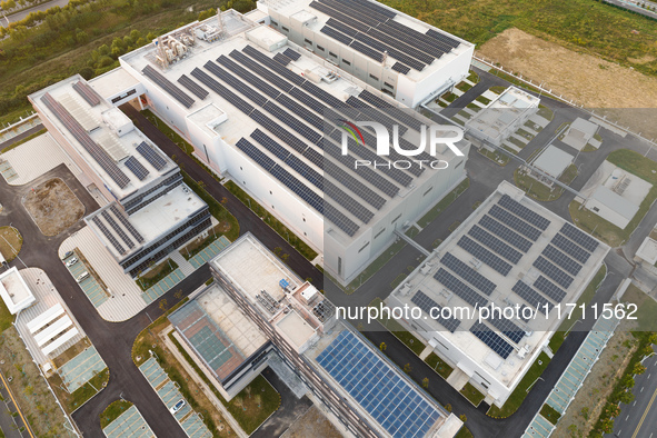 An aerial photo on October 4, 2024, shows the project of the R&D and production headquarters of Xintou Microelectronics Co., LTD in Hefei, A...