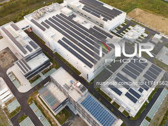 An aerial photo on October 4, 2024, shows the project of the R&D and production headquarters of Xintou Microelectronics Co., LTD in Hefei, A...