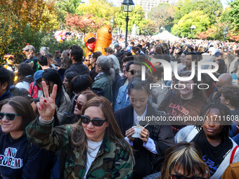 A large crowd gathers for the annual Halloween Dog Parade in Washington Square Park in New York City, USA, on October 26, 2024. (