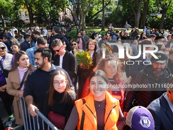 A large crowd gathers for the annual Halloween Dog Parade in Washington Square Park in New York City, USA, on October 26, 2024. (