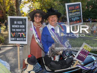 Kathy from Woodridge, N.J., and Lynn from Paramus with their dog Avery Finn win second prize during the Washington Square Park Halloween Dog...