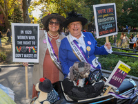 Kathy from Woodridge, N.J., and Lynn from Paramus with their dog Avery Finn win second prize during the Washington Square Park Halloween Dog...