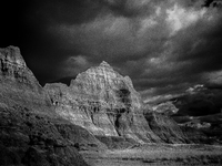 Badlands National Park protects 242,756 acres (379.3 sq mi; 982.4 km2) of sharply eroded buttes and pinnacles, along with the largest undist...