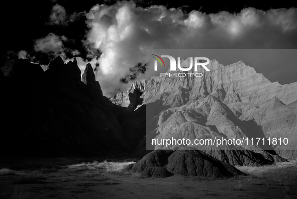 Badlands National Park protects 242,756 acres (379.3 sq mi; 982.4 km2) of sharply eroded buttes and pinnacles, along with the largest undist...