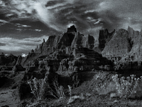 Badlands National Park protects 242,756 acres (379.3 sq mi; 982.4 km2) of sharply eroded buttes and pinnacles, along with the largest undist...