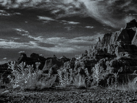 Badlands National Park protects 242,756 acres (379.3 sq mi; 982.4 km2) of sharply eroded buttes and pinnacles, along with the largest undist...