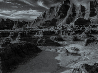 Badlands National Park protects 242,756 acres (379.3 sq mi; 982.4 km2) of sharply eroded buttes and pinnacles, along with the largest undist...