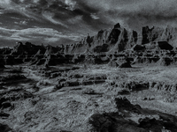 Badlands National Park protects 242,756 acres (379.3 sq mi; 982.4 km2) of sharply eroded buttes and pinnacles, along with the largest undist...