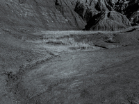 Badlands National Park protects 242,756 acres (379.3 sq mi; 982.4 km2) of sharply eroded buttes and pinnacles, along with the largest undist...