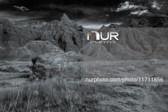 Badlands National Park protects 242,756 acres (379.3 sq mi; 982.4 km2) of sharply eroded buttes and pinnacles, along with the largest undist...