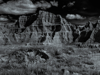 Badlands National Park protects 242,756 acres (379.3 sq mi; 982.4 km2) of sharply eroded buttes and pinnacles, along with the largest undist...