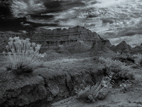 Badlands National Park protects 242,756 acres (379.3 sq mi; 982.4 km2) of sharply eroded buttes and pinnacles, along with the largest undist...