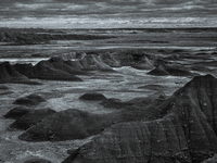 Badlands National Park protects 242,756 acres (379.3 sq mi; 982.4 km2) of sharply eroded buttes and pinnacles, along with the largest undist...