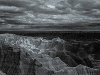 Badlands National Park protects 242,756 acres (379.3 sq mi; 982.4 km2) of sharply eroded buttes and pinnacles, along with the largest undist...