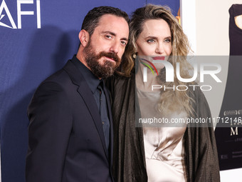 Pablo Larrain and Angelina Jolie arrive at the 2024 AFI Fest - Premiere Screening Of Netflix's 'Maria' held at the TCL Chinese Theatre IMAX...