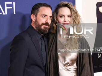 Pablo Larrain and Angelina Jolie arrive at the 2024 AFI Fest - Premiere Screening Of Netflix's 'Maria' held at the TCL Chinese Theatre IMAX...