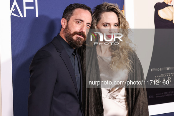 Pablo Larrain and Angelina Jolie arrive at the 2024 AFI Fest - Premiere Screening Of Netflix's 'Maria' held at the TCL Chinese Theatre IMAX...