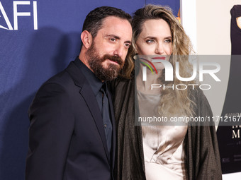 Pablo Larrain and Angelina Jolie arrive at the 2024 AFI Fest - Premiere Screening Of Netflix's 'Maria' held at the TCL Chinese Theatre IMAX...