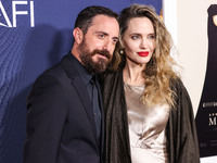 Pablo Larrain and Angelina Jolie arrive at the 2024 AFI Fest - Premiere Screening Of Netflix's 'Maria' held at the TCL Chinese Theatre IMAX...