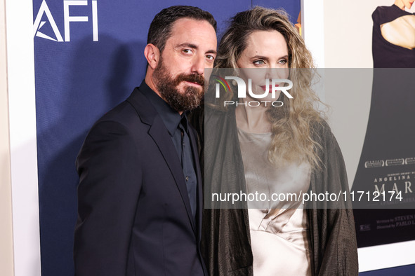 Pablo Larrain and Angelina Jolie arrive at the 2024 AFI Fest - Premiere Screening Of Netflix's 'Maria' held at the TCL Chinese Theatre IMAX...