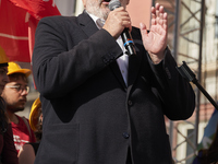 Michele Emiliano, President of the Apulia Region, speaks at a rally advocating for world peace. Thousands of people march through Bari, Ital...