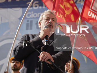 Michele Emiliano, President of the Apulia Region, speaks at a rally advocating for world peace. Thousands of people march through Bari, Ital...