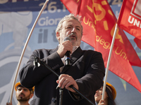 Michele Emiliano, President of the Apulia Region, speaks at a rally advocating for world peace. Thousands of people march through Bari, Ital...