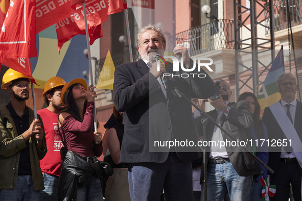 Michele Emiliano, President of the Apulia Region, speaks at a rally advocating for world peace. Thousands of people march through Bari, Ital...