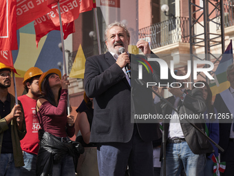 Michele Emiliano, President of the Apulia Region, speaks at a rally advocating for world peace. Thousands of people march through Bari, Ital...