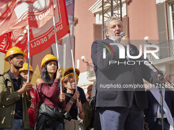 Michele Emiliano, President of the Apulia Region, speaks at a rally advocating for world peace. Thousands of people march through Bari, Ital...