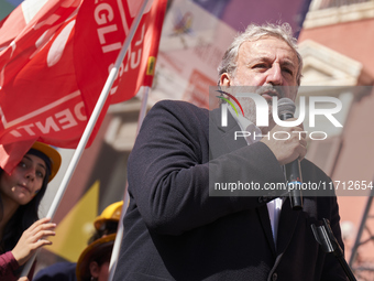 Michele Emiliano, President of the Apulia Region, speaks at a rally advocating for world peace. Thousands of people march through Bari, Ital...