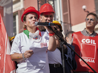 Gigia Bucci, General Secretary of CGIL Puglia, speaks at a rally advocating for world peace. Thousands of people march through Bari, Italy,...